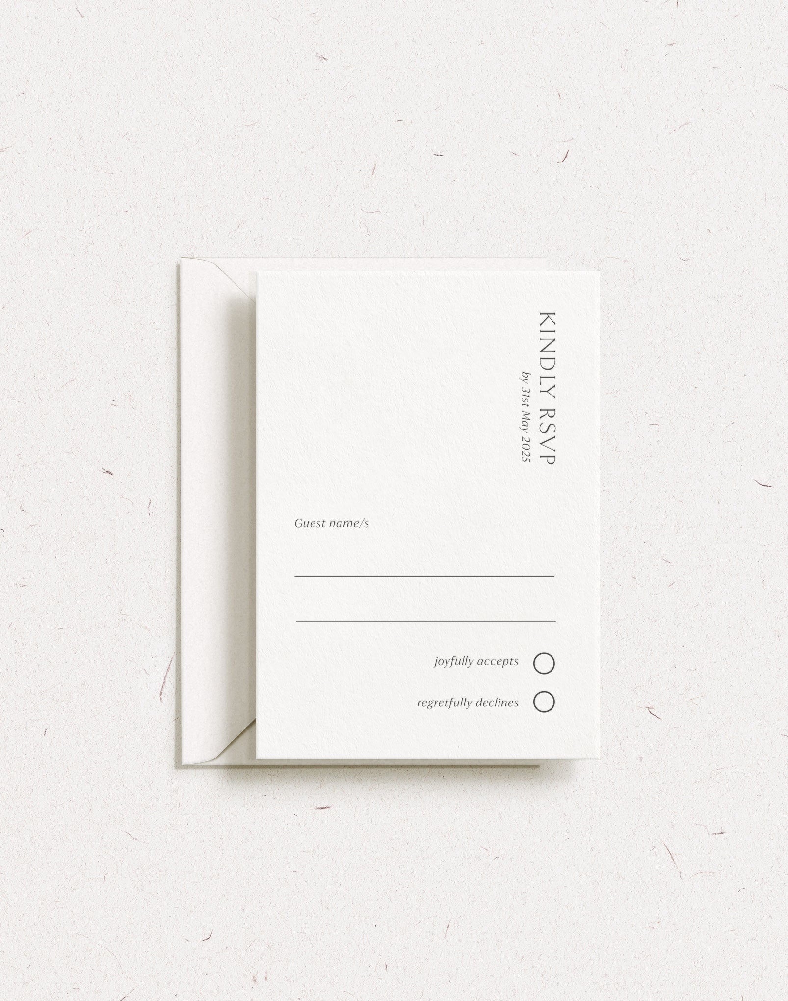 Luxury customisable wedding postal rsvp card shown with classic black letterpress and envelope