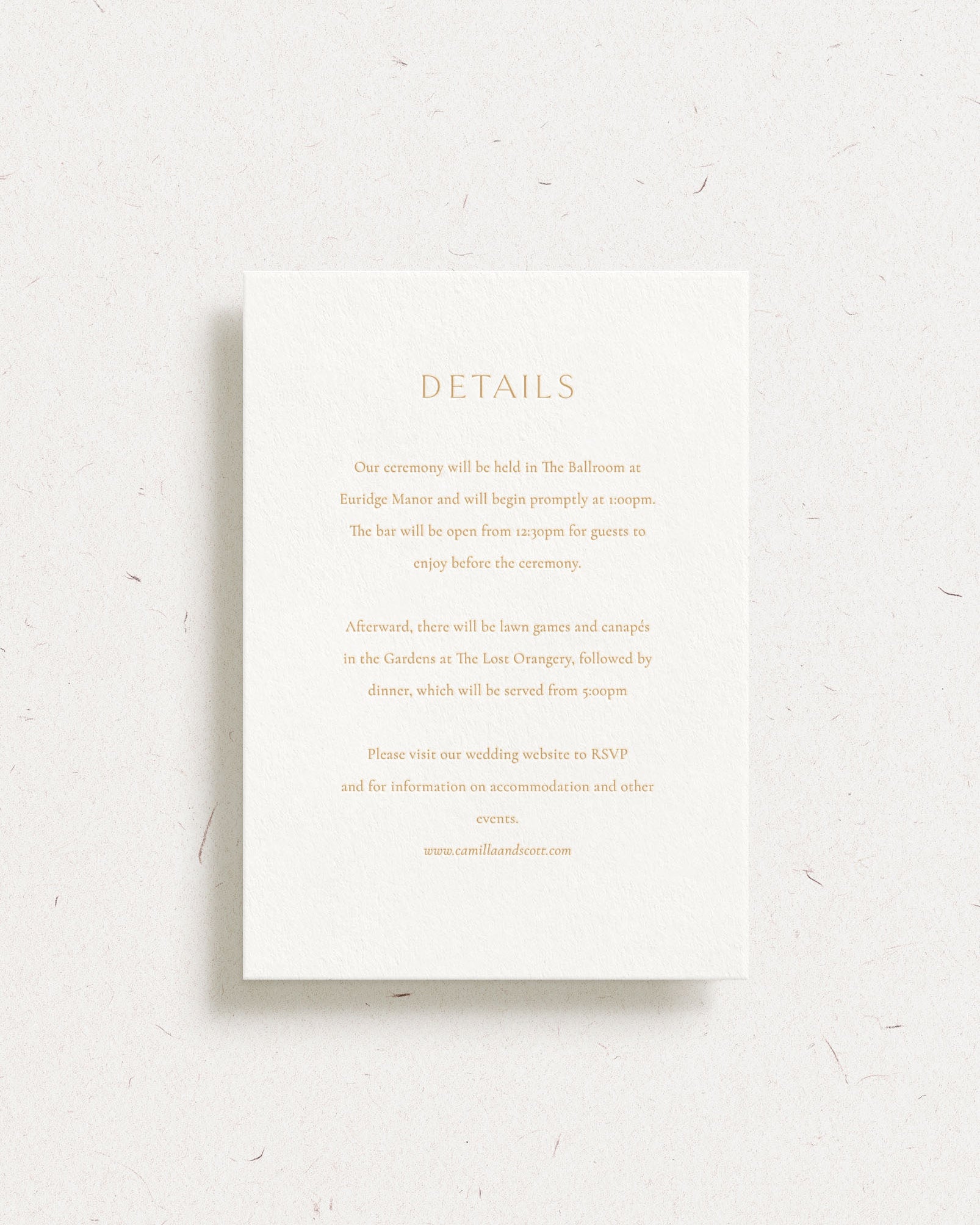 Luxury customisable wedding details card shown with gold foil stamping