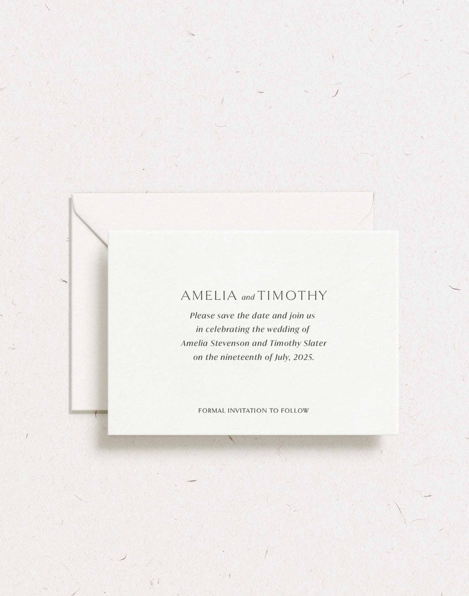 Letterpress save the date in black ink on white for a classic look