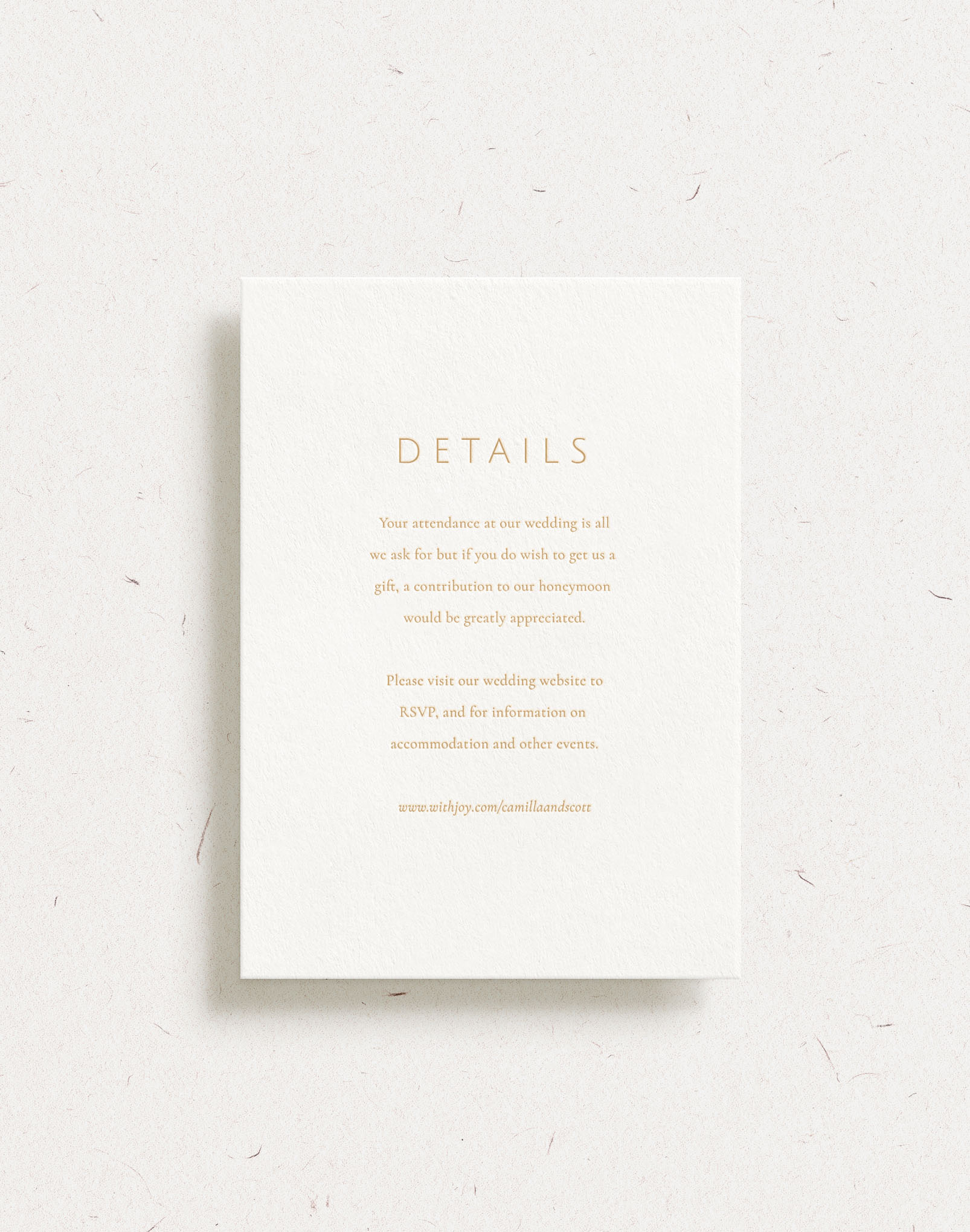 Luxury customisable wedding details card shown with gold foil stamping