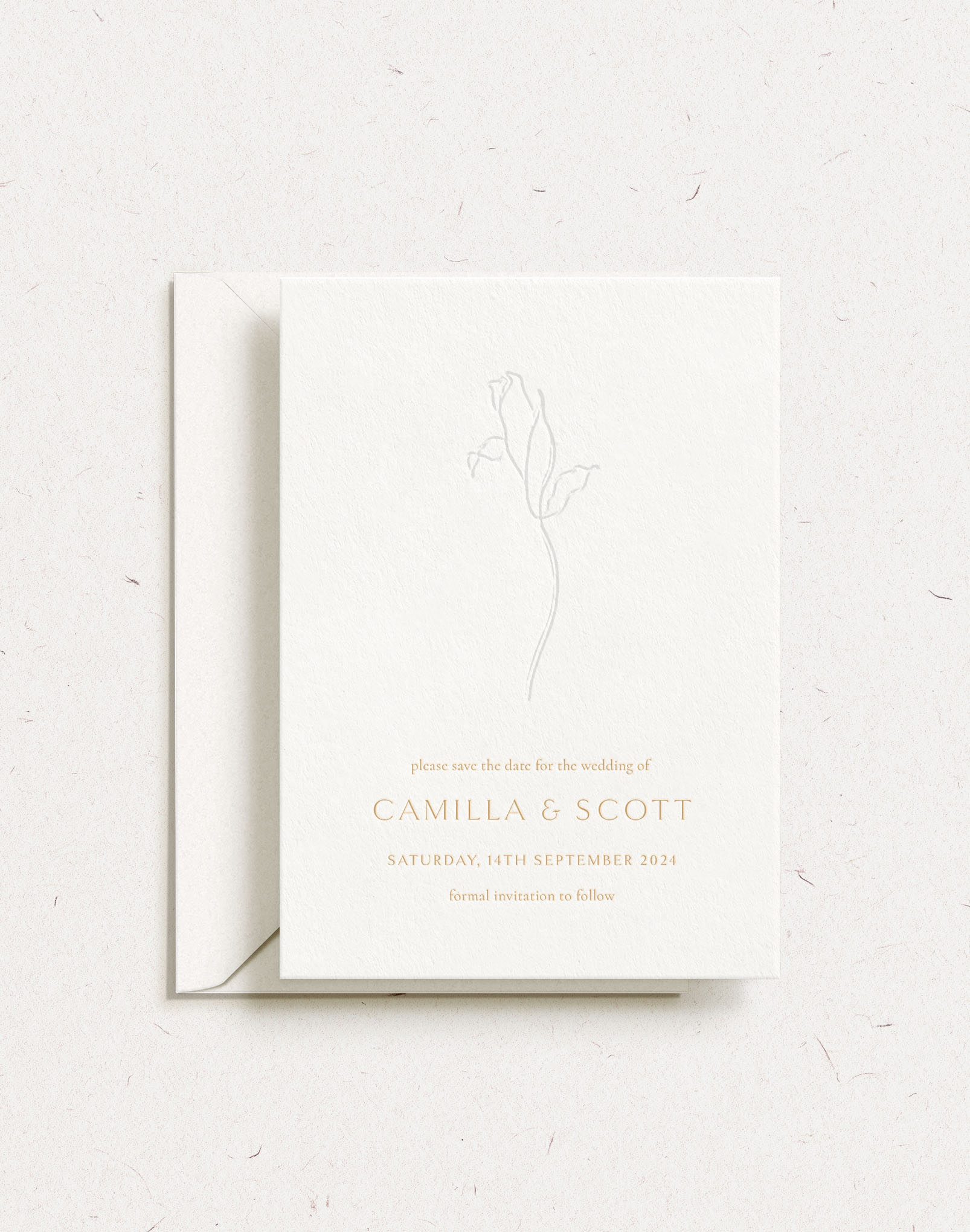 Luxury customisable save the date shown with holographic foil and envelope