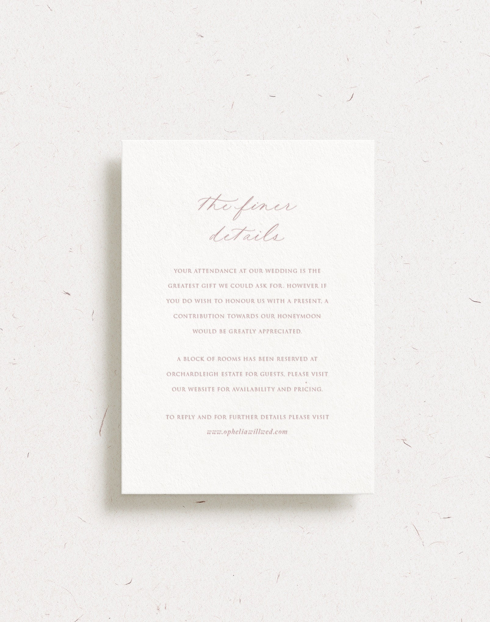 Luxury customisable wedding details card shown on cotton paper, with dusky rose letterpress
